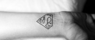 Superhero tattoo sign