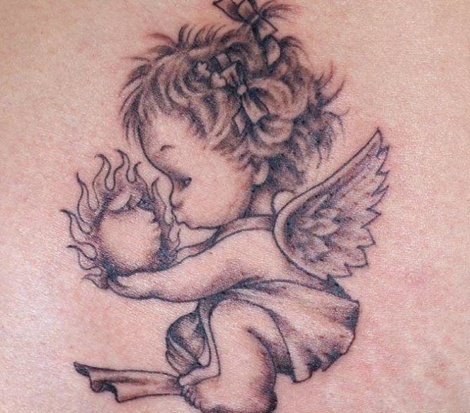 Tattoo of guardian angel on his arm