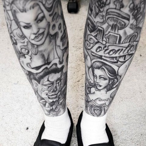 Chicano tattoo on legs