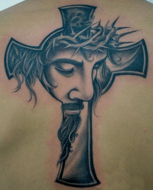 Tattoo of the image of Jesus and the cross