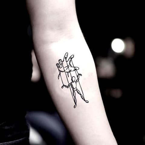 Tattoo of a puppeteer