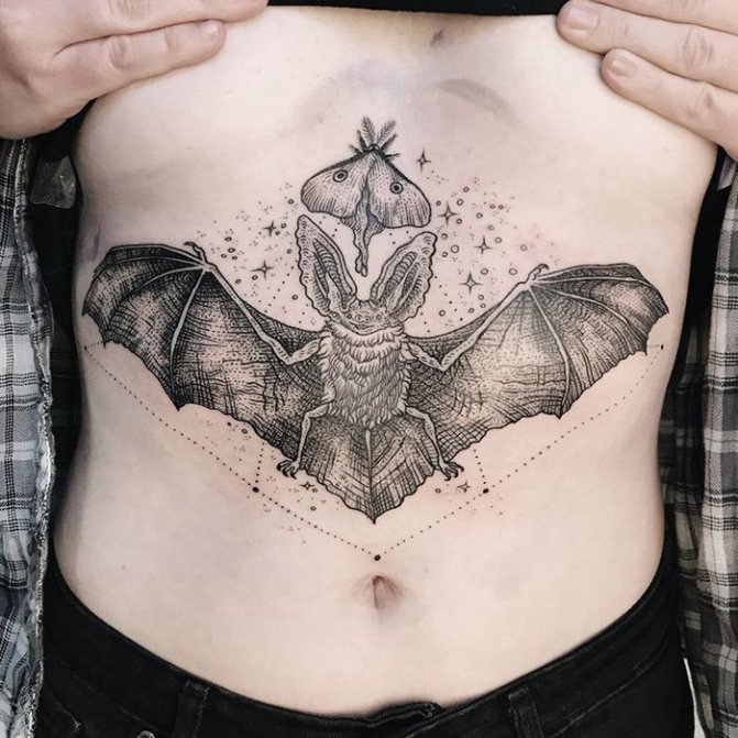 Bat tattoo lineworks on chest