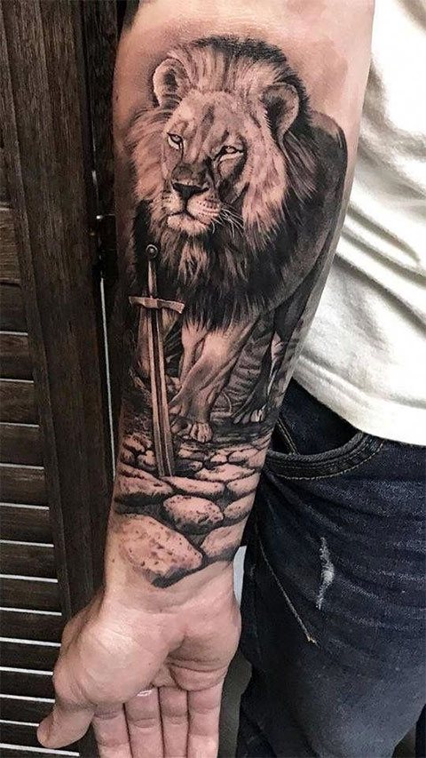 Tattoo of a lion on my arm - a male version with a plot