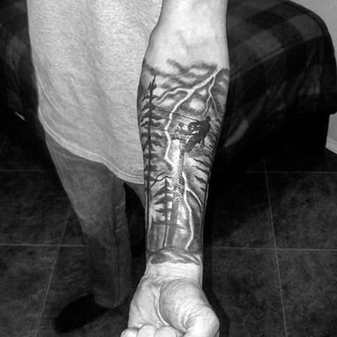 Tattoo lightning on forearm