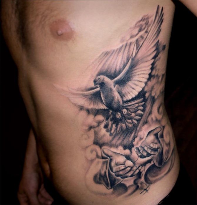 Tattoo on the side of a man in the form of a dove