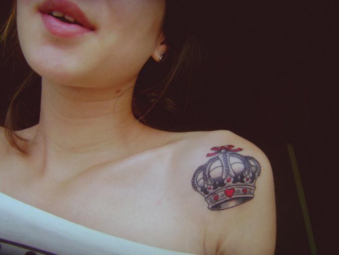 Tattoo on woman's left shoulder