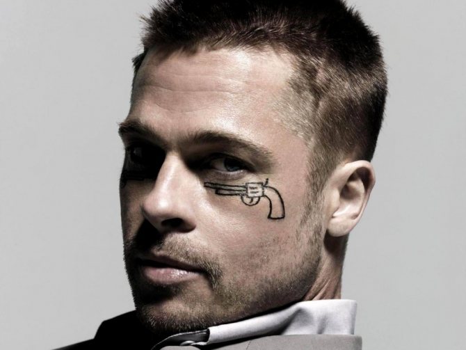 Bradd Pitt face tattoo