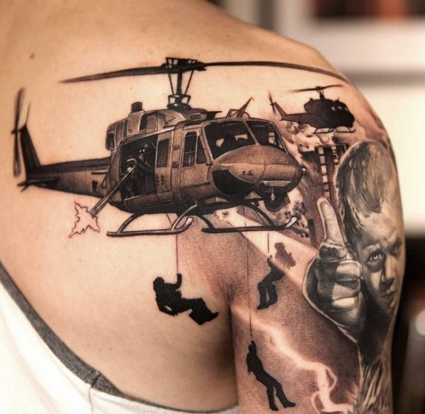 Tattoo on the shoulder blade of the GRU: helicopter and Special Forces