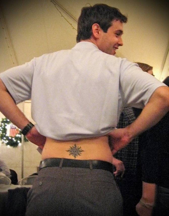 Tattoo on a man's lower back