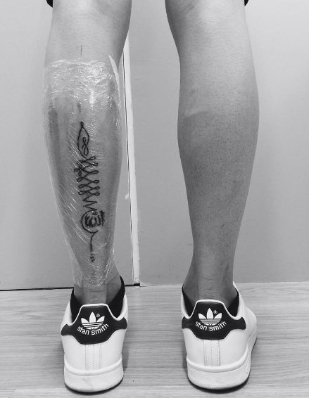 Muslim style leg tattoo