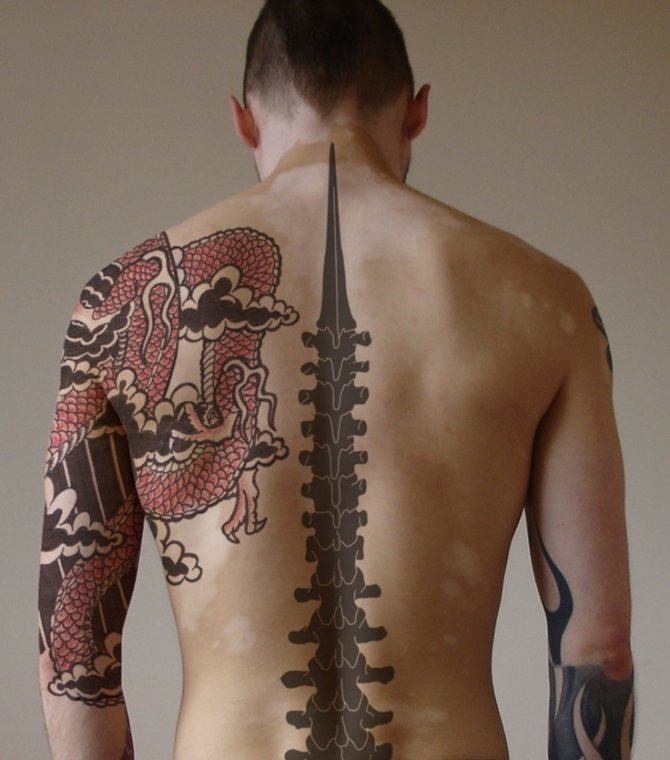 Tattoo on a man's spine