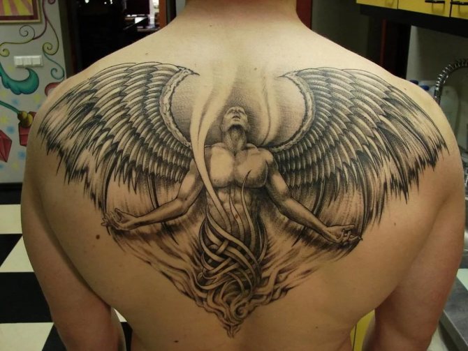 Tattoo on his back