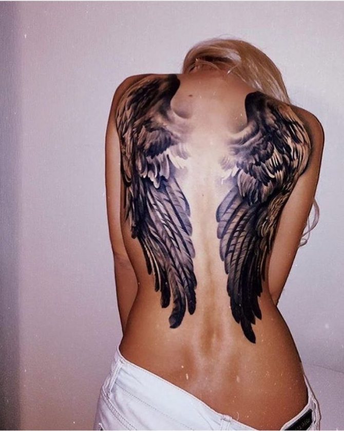 Tattoo on her back