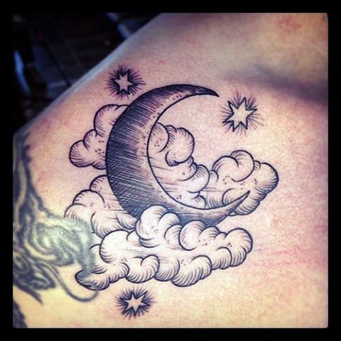 Tattoo of a cloud and a month