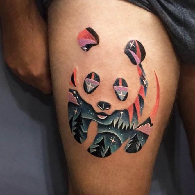 Tattoo of a panda on his thigh