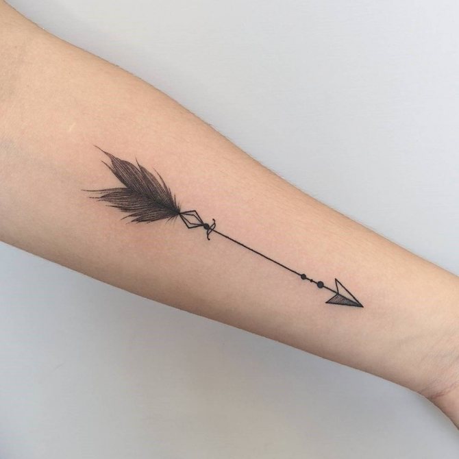 Tattoo of a feather on his arm