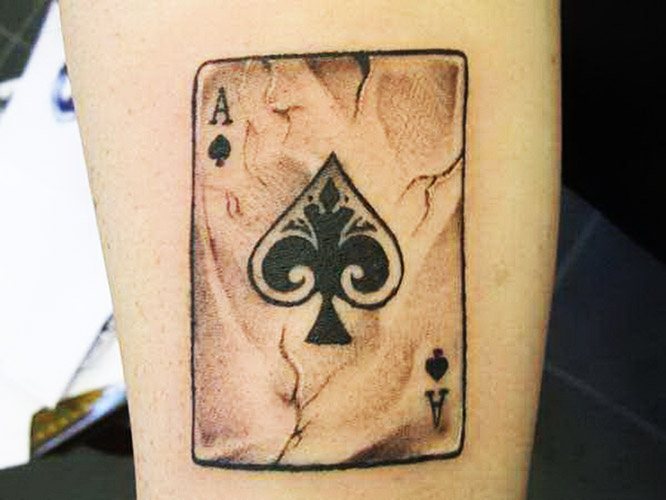 Tattoo of Spades. Meaning of the suit of spades in women, men