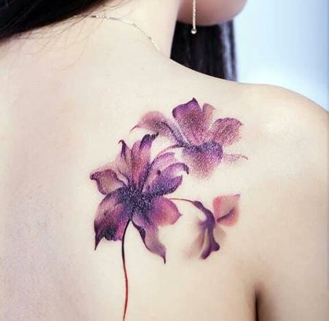 Tattoo of a lily - photo