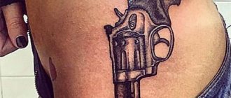 Tattoo with a gun on the side of a girl