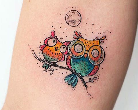 Tattoo of an owl and moon in color