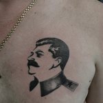 Tattoo of Stalin on his chest