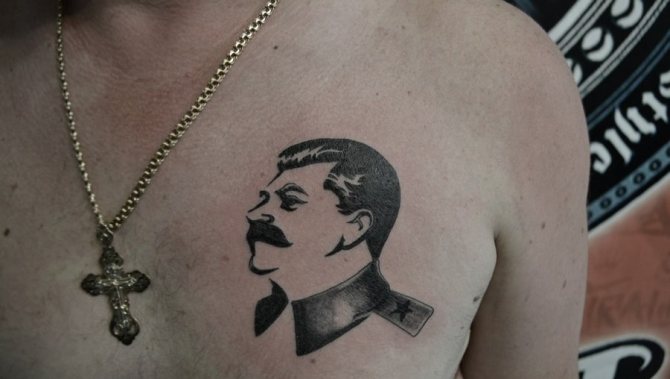 Tattoo of Stalin on his chest