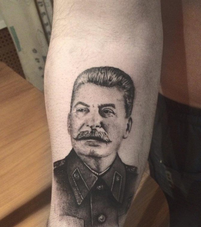 Stalin tattoo on his arm