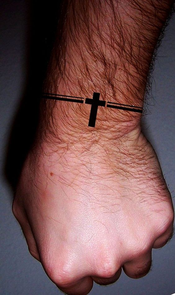 Tattoo in the shape of a bracelet with a cross