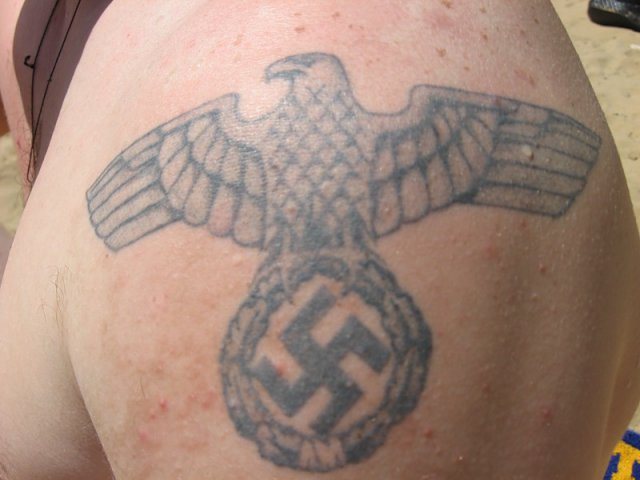 Tattoo in the form of a swastika