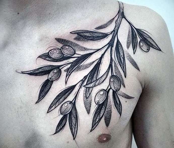 Tattoo of a branch on his chest