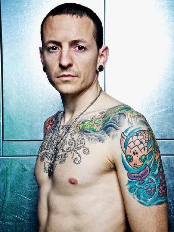 Chester Bennington tattoos on chest and arms