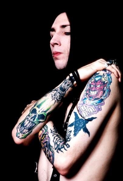 Marilyn Manson tattoos on his arms