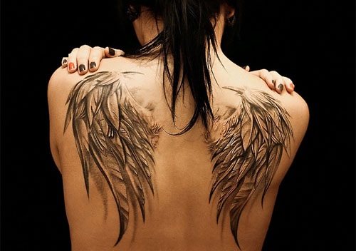 Tattoos on the shoulder blade for girls. Photos, ideas, designs, inscriptions with translation, birds, flowers, patterns, hieroglyphs