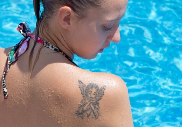 Shoulder tattoos for girls: small, round, inscriptions, patterns, birds, animals, insects. Meanings and photos of the best tattoos