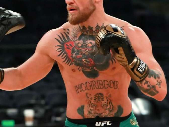 MacGregor's torso, with tattoos