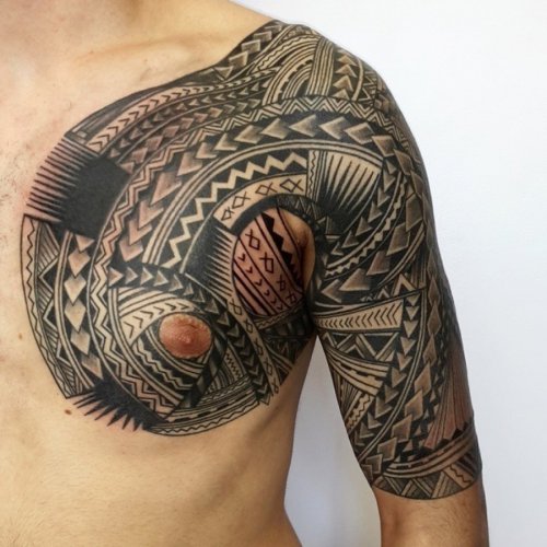 Treble tattoo meaning pattern on the shoulder and part of the chest