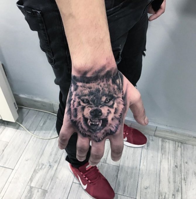 wolf with a wolf grin tattoo meaning