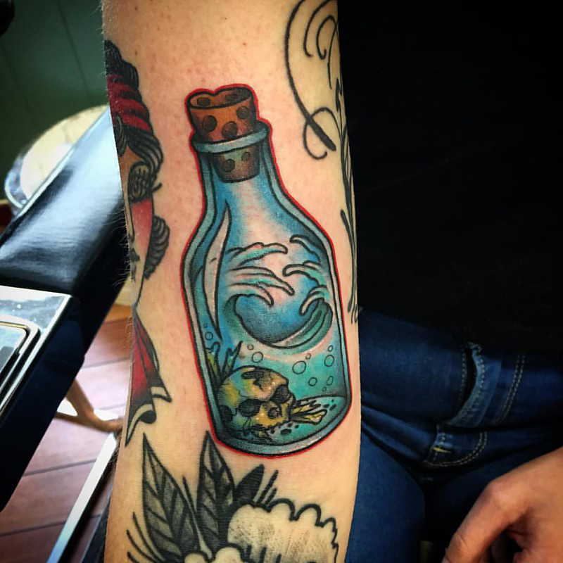 Wave tattoo in a bottle