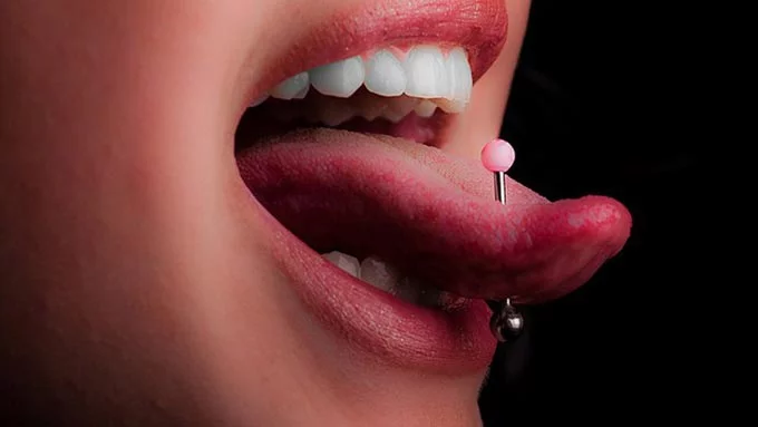Everything about tongue piercing: piercing, treatment, possible consequences