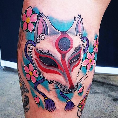 Japanese fox mask Kitsune tattoo. Meaning, sketch, photo