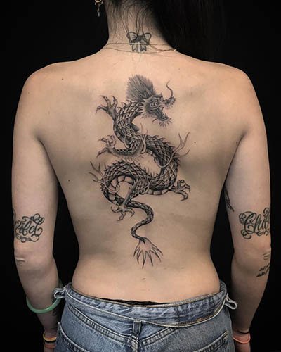 Japanese dragon. Sketches of a simple tattoo, in color, photo, meaning