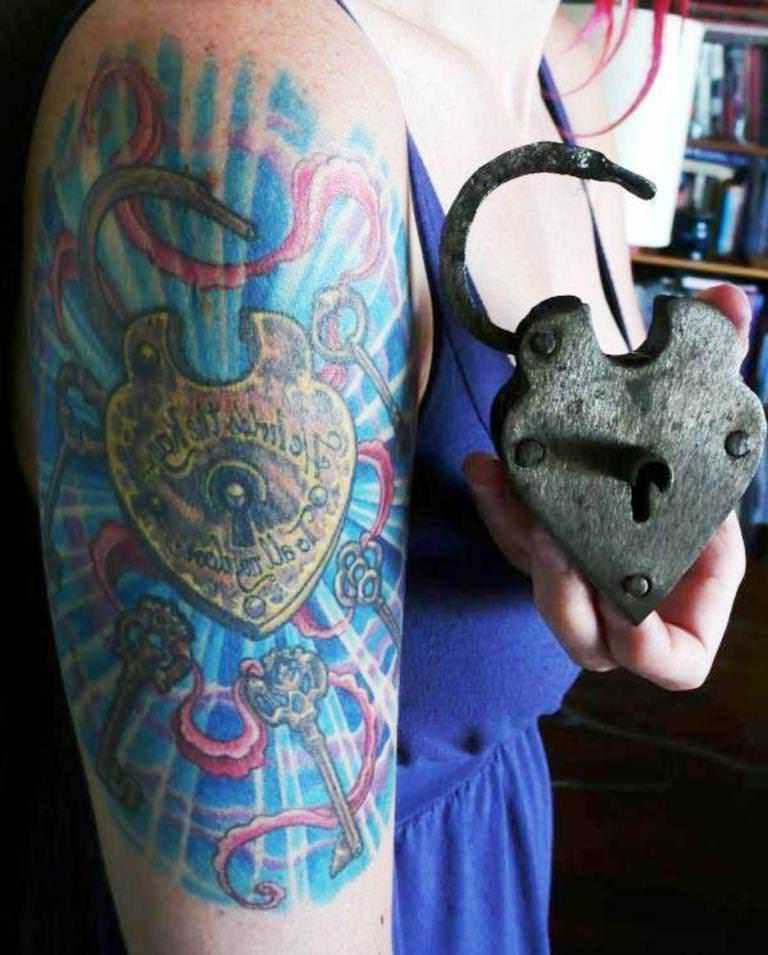 lock tattoo on the shoulder