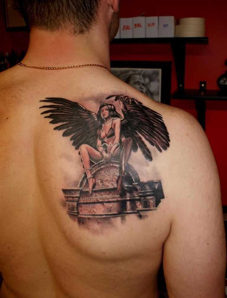 Woman with wings was applied as a tattoo as a talisman