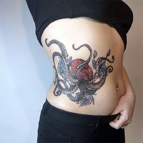 Tattoo of a Octopus on the side