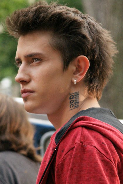 Famous tattoo of actor Pavel Prilunoy on the neck